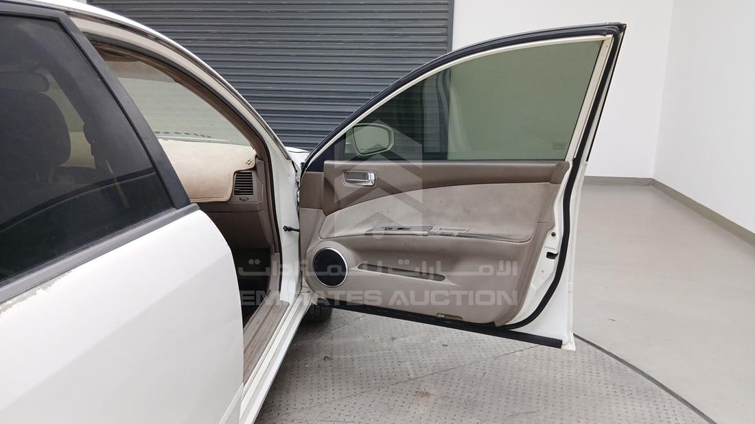 نيسان التيما 2005 — الباب الأمامي الأيمن — صورة 24