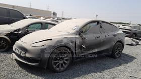 تيسلا Model Y 2023 — الزاوية الأمامية اليسرى — صورة 5 — صورة مصغرة