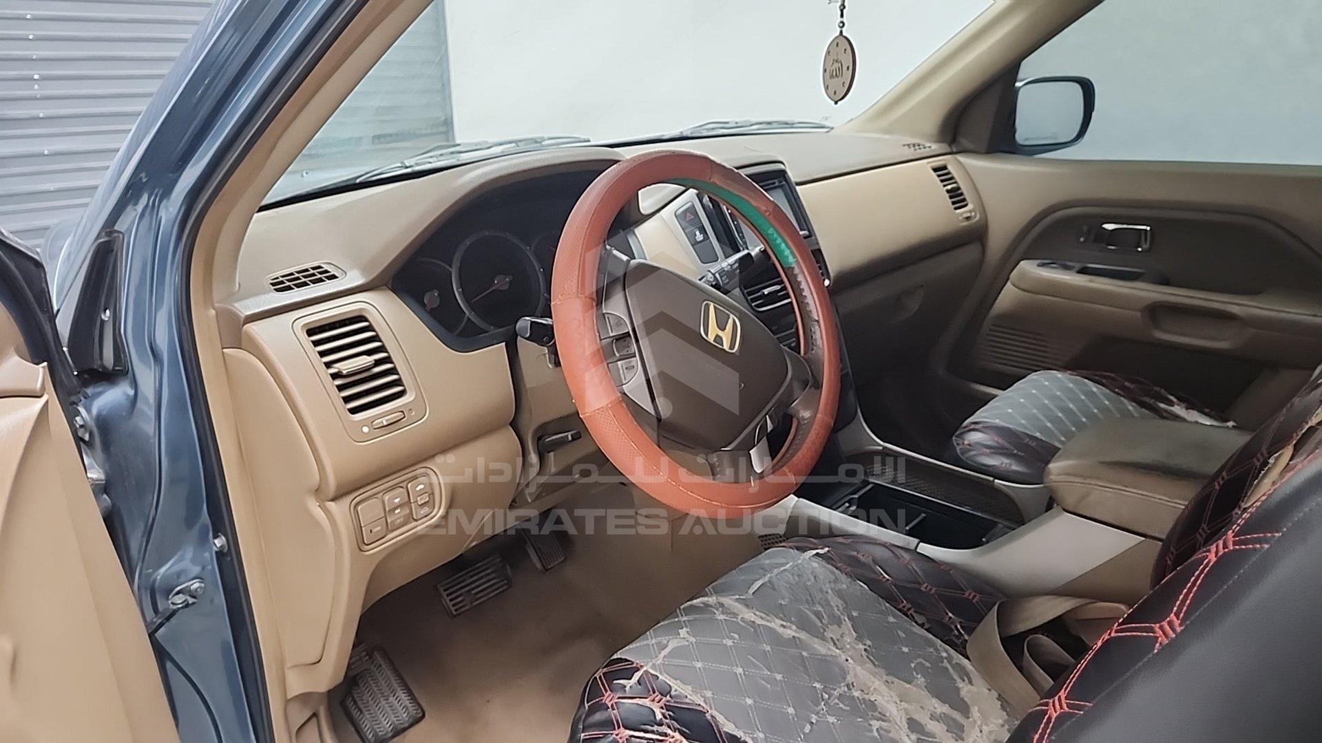 2007 HONDA MRV VIN: 5FNYF18577B700424