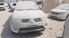 ميتسوبيشي L 200 2008 — الزاوية الأمامية بالكامل — صورة 1 — صورة مصغرة