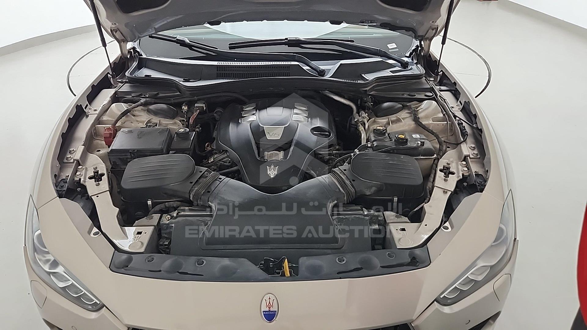 2014 MASERATI GHIBLI VIN: ZAMSS57F6E1087023