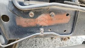 2014 Isuzu NMR — VIN on Frame — Photo 3 — Thumbnail