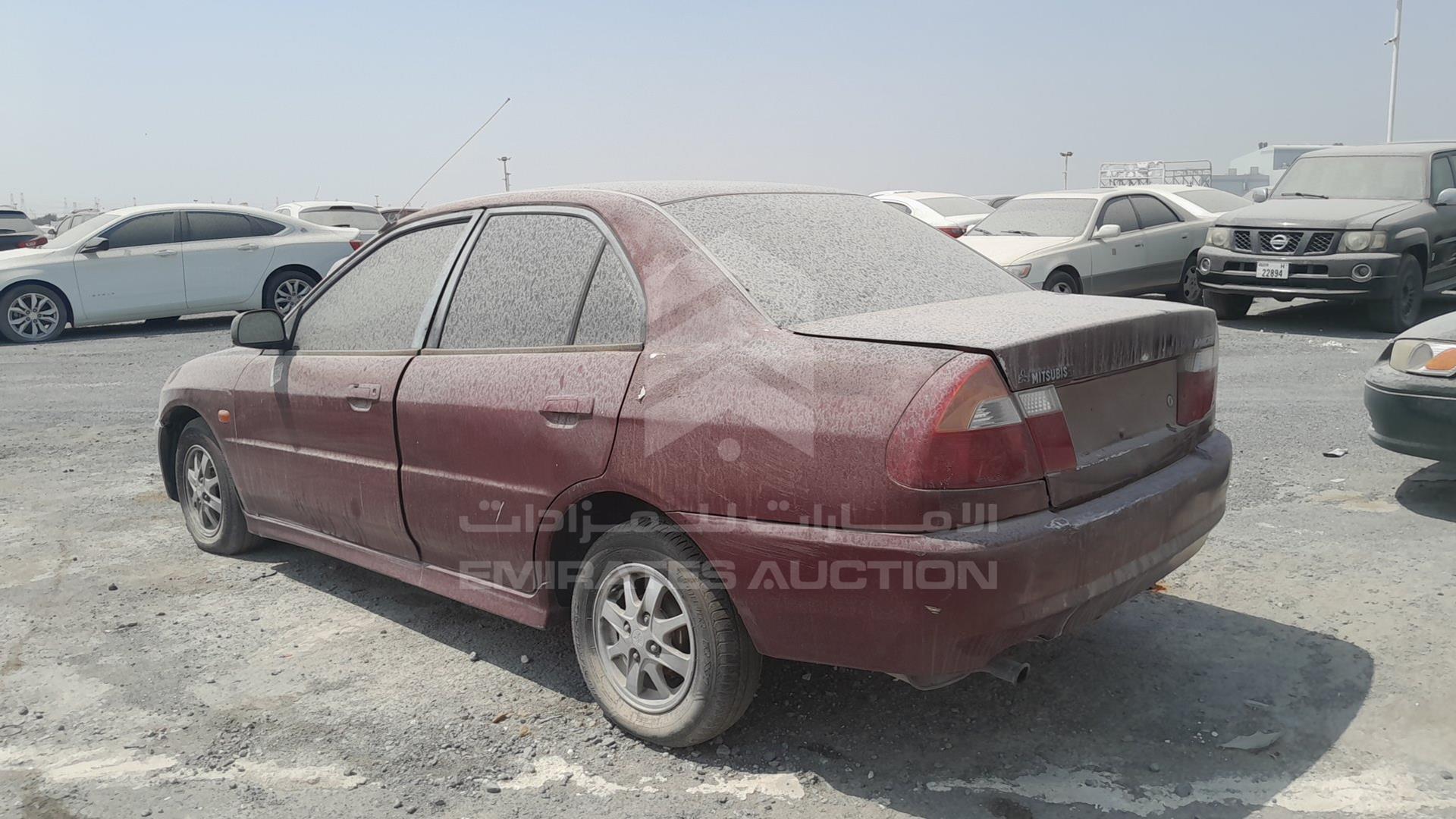 1999 MITSUBISHI LANCER VIN: JMYSRCK4AXU000886