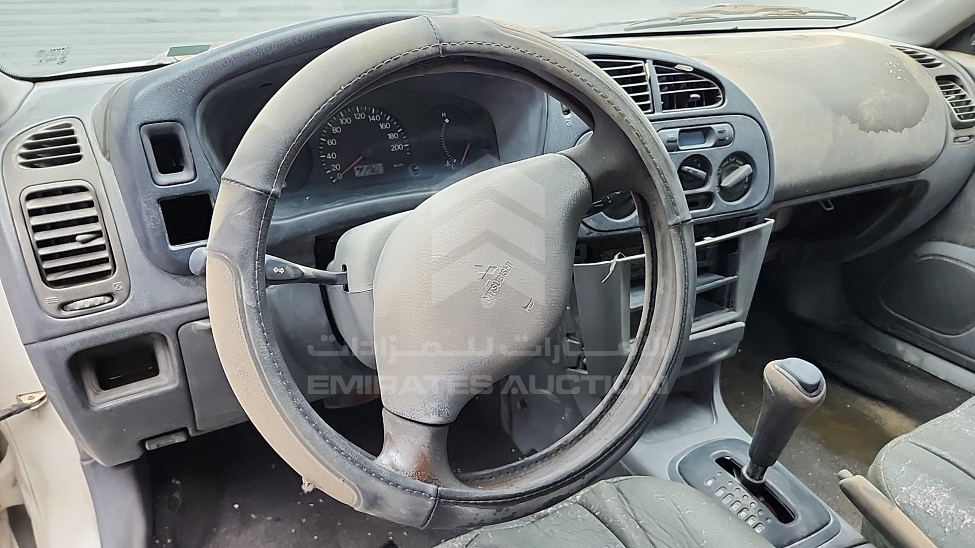 1999 MITSUBISHI LANCER VIN: JMYSRCK1AXU001169