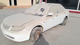 2003 Mazda 323 — Front Left Angle — Photo 5 — Thumbnail