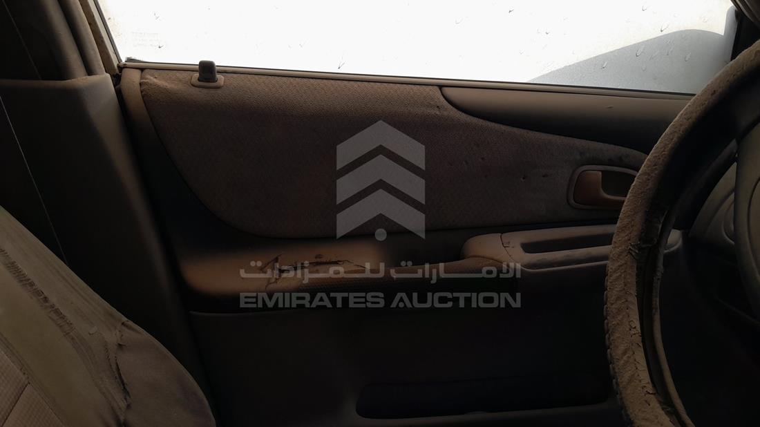 2003 Mazda 323 — Front Left Door — Photo 10