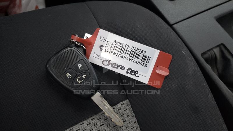 1J4PN2GKXAW148555 Auction: EmiratesAuction Lot: 406545 1J4PN2GKXAW148555 Jeep Cherokee 2010 BLACK Photo 6