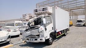 2026 Isuzu NPR — Front Left Angle — Photo 5 — Thumbnail