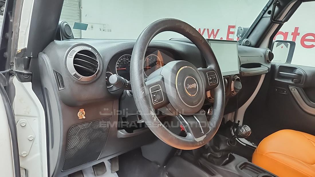 2014 Jeep Wrangler — Front Left Driver Dashboard View — Photo 11