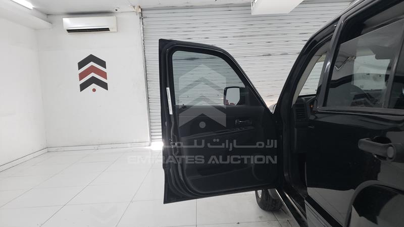 1J4PN2GKXAW148555 Auction: EmiratesAuction Lot: 406545 1J4PN2GKXAW148555 Jeep Cherokee 2010 BLACK Photo 11