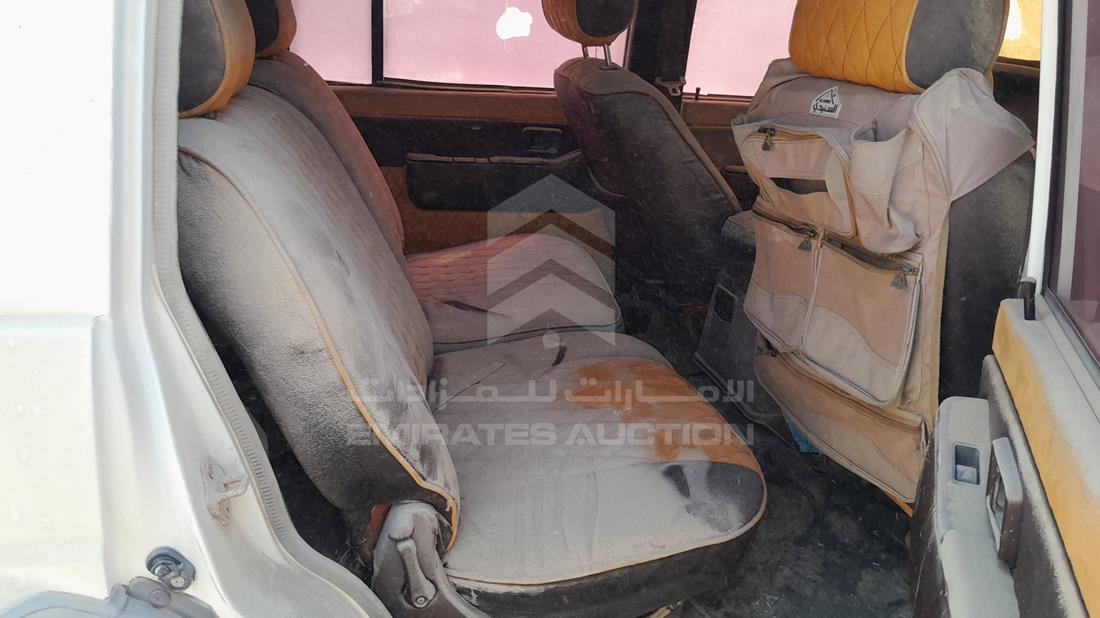 نيسان Abarth 695 1995 — زاوية الراكب الخلفي اليمنى — صورة 20