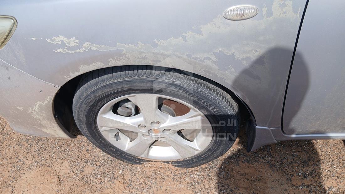 تويوتا كورولا 2012 — الإطار الأمامي الأيسر — صورة 30