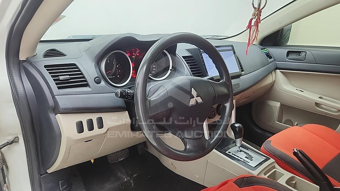 2016 Mitsubishi Lancer — Front Left Driver Dashboard View — Photo 12