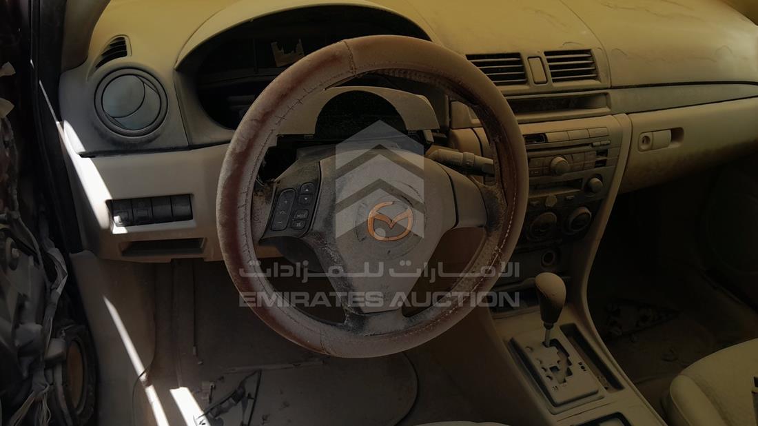 مازدا 3 2006 — التحكمات في عجلة القيادة — صورة 13