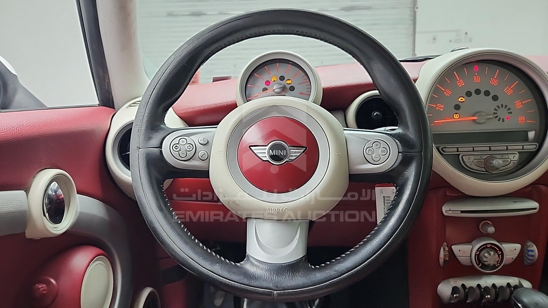 2010 MINI COOPER VIN: WMWMF3C55ATZ25394