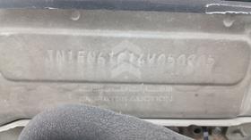 2004 Nissan — VIN on Frame — Photo 5 — Thumbnail