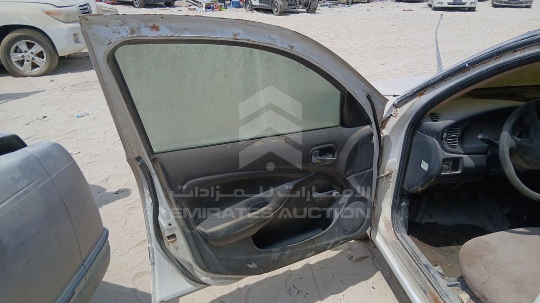 نيسان صني 2006 — الباب الأمامي الأيسر — صورة 9