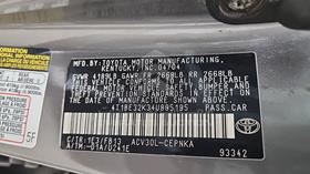 2004 Toyota Camry — VIN on Frame — Photo 3 — Thumbnail