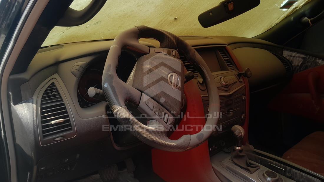 نيسان باترول 2011 — زاوية واجهة السائق الأمامية اليسرى — صورة 11