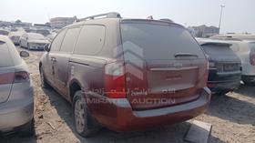 2008 Kia Carnival — Rear Left Angle — Photo 6 — Thumbnail