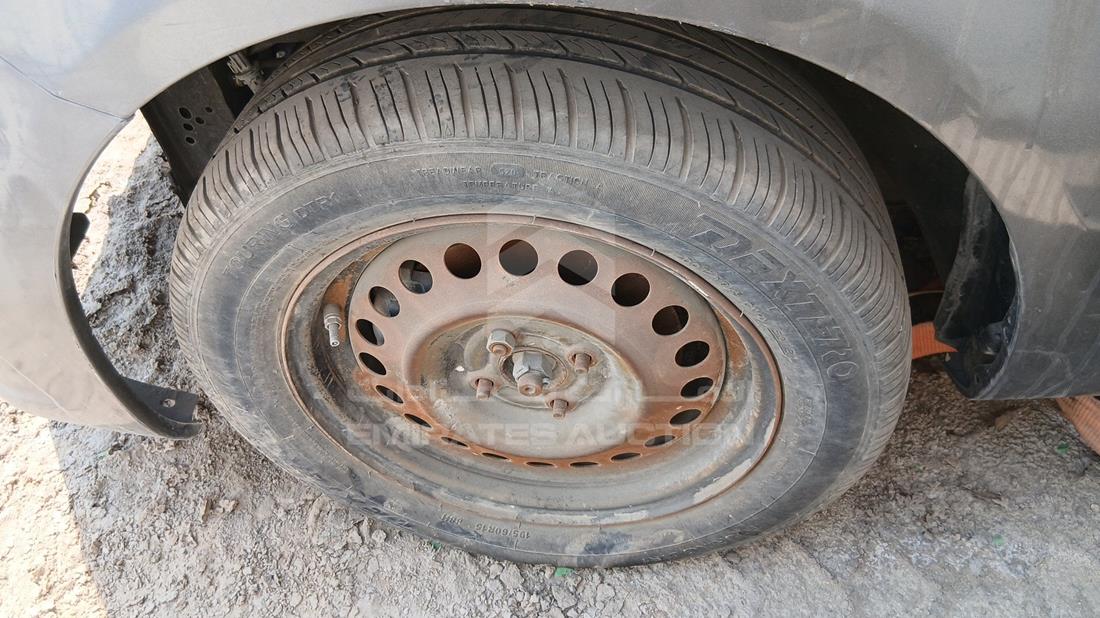 2016 Nissan Versa - Scrap without document — Front Left Tyre — Photo 32