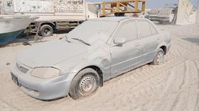2000 Mazda 323 — Front Left Angle — Photo 5 — Thumbnail