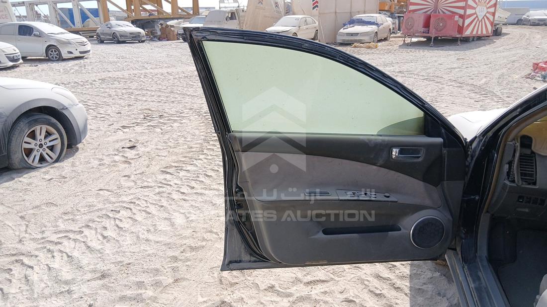 نيسان التيما 2006 — الباب الأمامي الأيسر — صورة 10