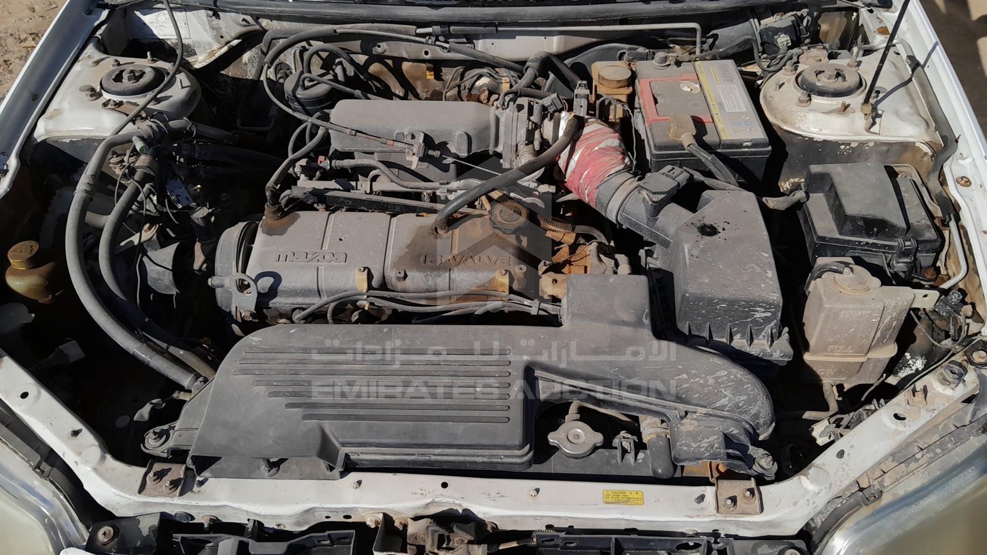 2002 MAZDA 323 VIN: JM7BJ123121209110