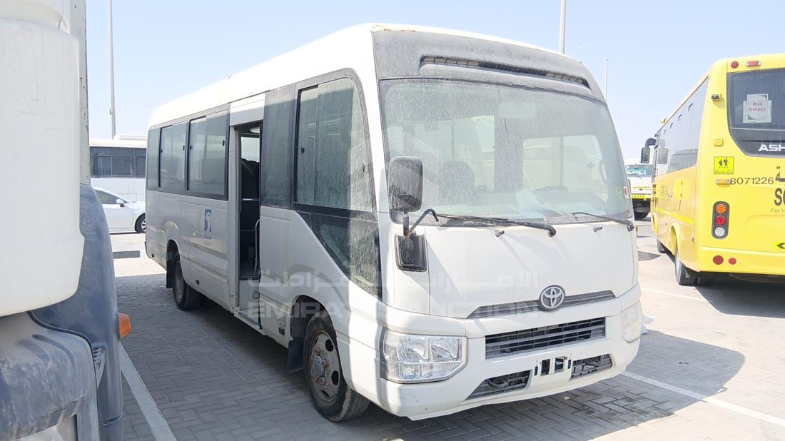 2020 Toyota Coaster — Front Right Angle — Photo 9