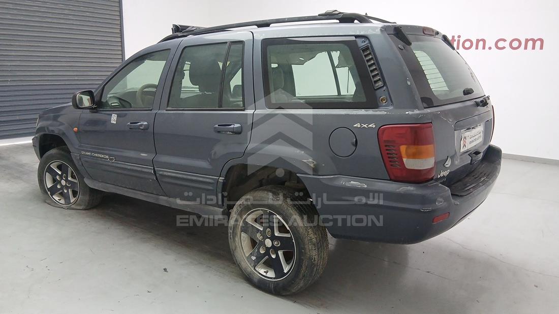 جيب جراند شيروكي 2001 — الزاوية الخلفية اليسرى — صورة 7