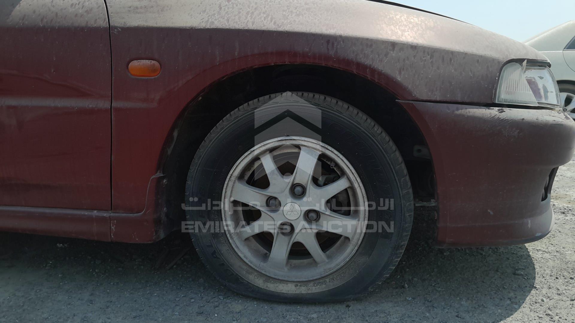 1999 MITSUBISHI LANCER VIN: JMYSRCK4AXU000886
