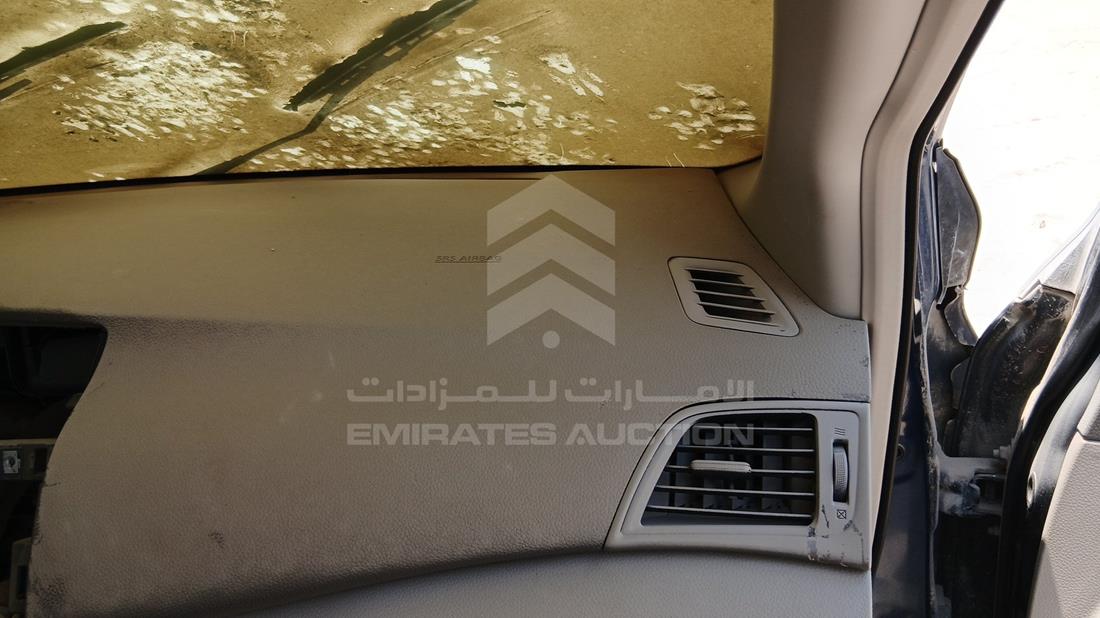 نيسان تيدا 2015 — زاوية واجهة الراكب الأمامي الأيمن — صورة 24