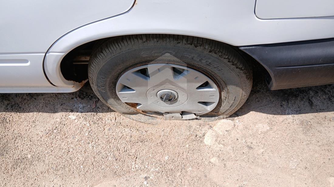 1999 Nissan Sunny — Rear Left Tyre — Photo 26