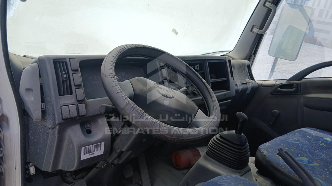 2014 Isuzu NMR — Front Left Driver Dashboard View — Photo 11