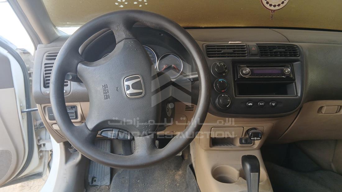 هوندا سيفيك 2004 — التحكمات في عجلة القيادة — صورة 13