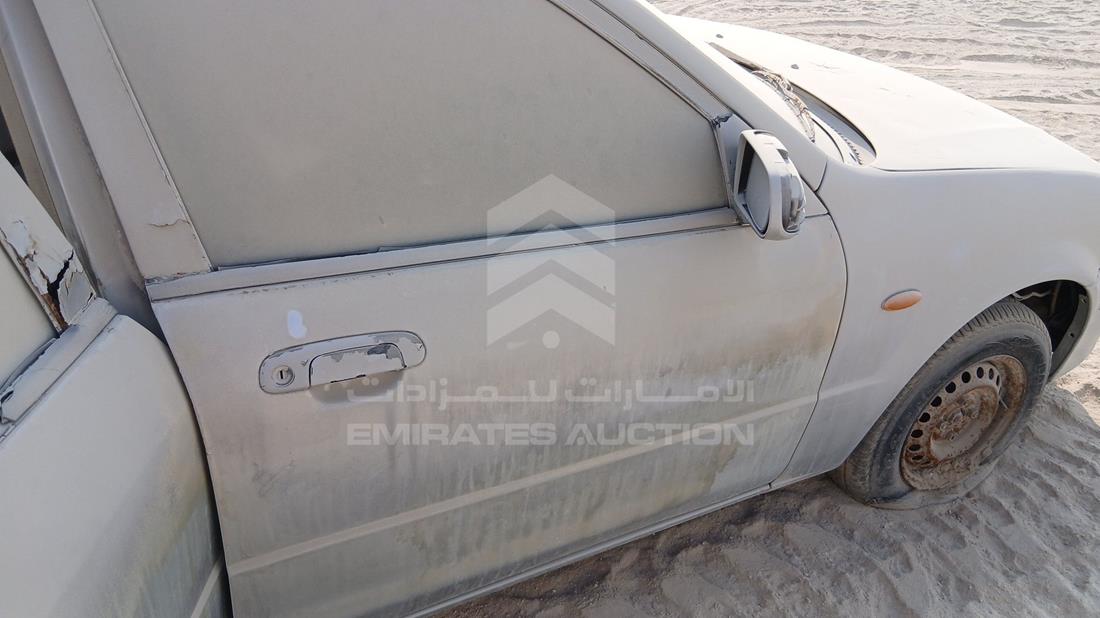 2000 Mazda 323 — Front Right Door — Photo 24