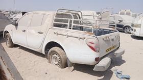 ميتسوبيشي L 200 2008 — الزاوية الخلفية اليسرى — صورة 6 — صورة مصغرة
