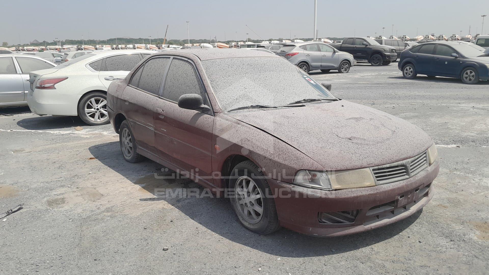 1999 MITSUBISHI LANCER VIN: JMYSRCK4AXU000886