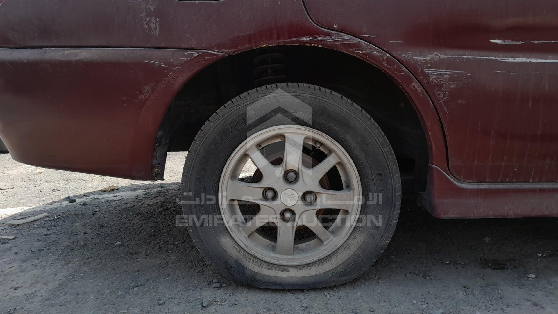 1999 MITSUBISHI LANCER VIN: JMYSRCK4AXU000886