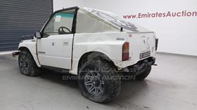 1990 Suzuki Vitara — Rear Left Angle — Photo 6 — Thumbnail