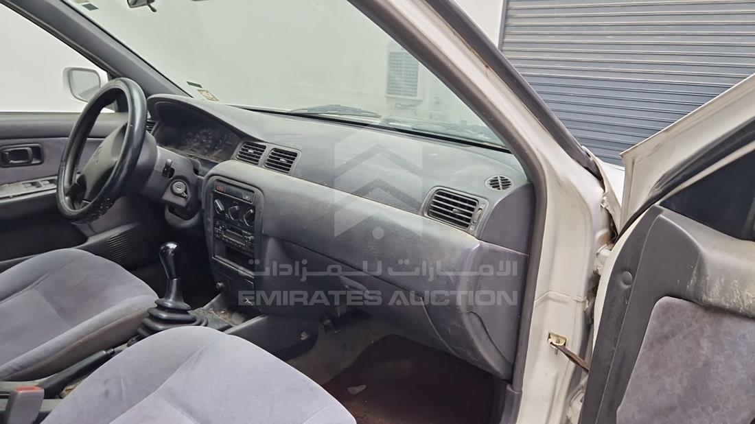 1999 Nissan Sunny — Front Right Passenger Dashboard View — Photo 26