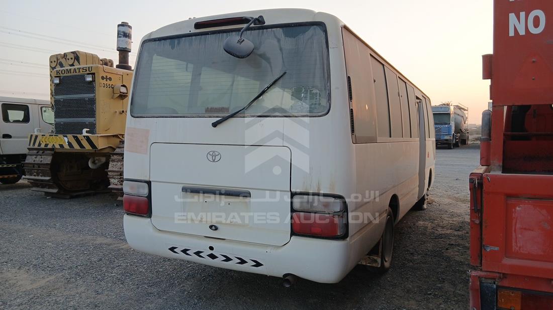 2014 Toyota Coaster — Rear Right Angle — Photo 8