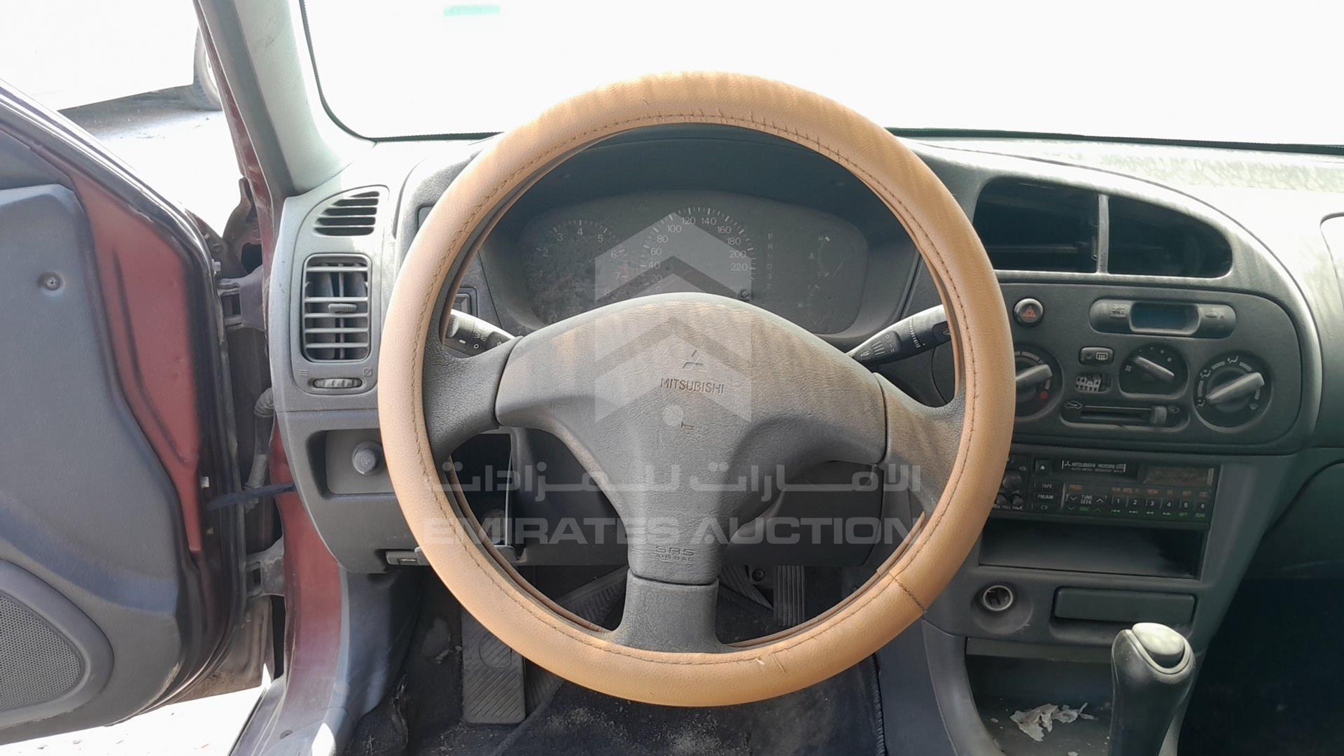 1999 MITSUBISHI LANCER VIN: JMYSRCK4AXU000886