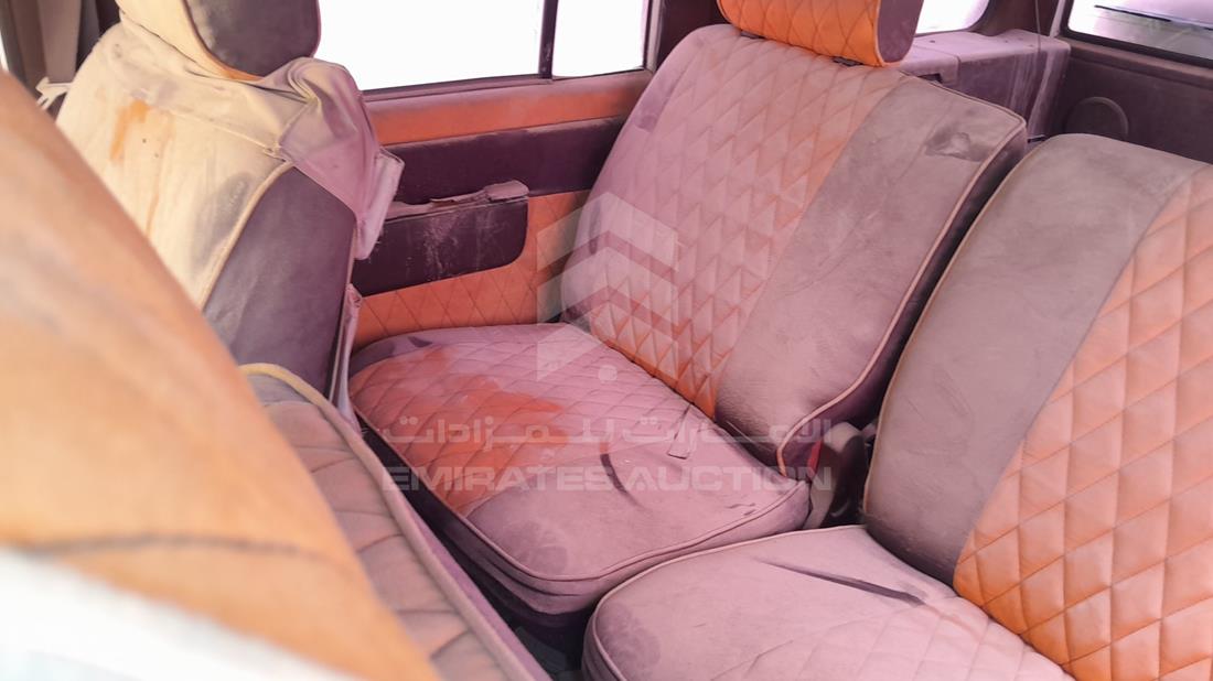 نيسان Abarth 695 1995 — زاوية الراكب الخلفي اليسرى — صورة 19