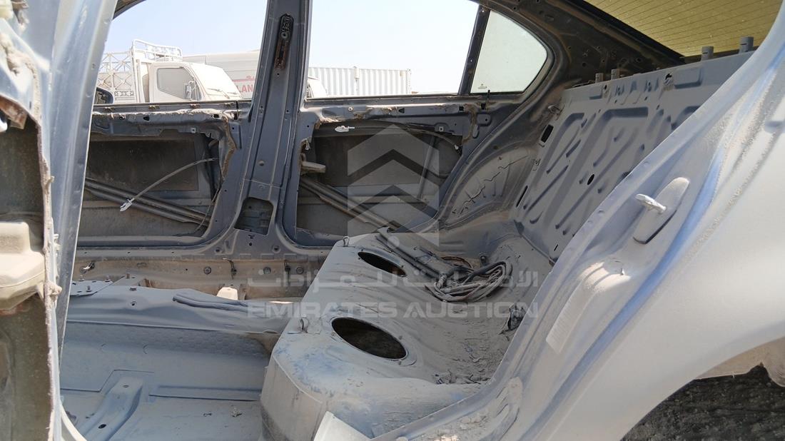بي ام دبليو 325 2004 — زاوية الراكب الخلفي اليسرى — صورة 19