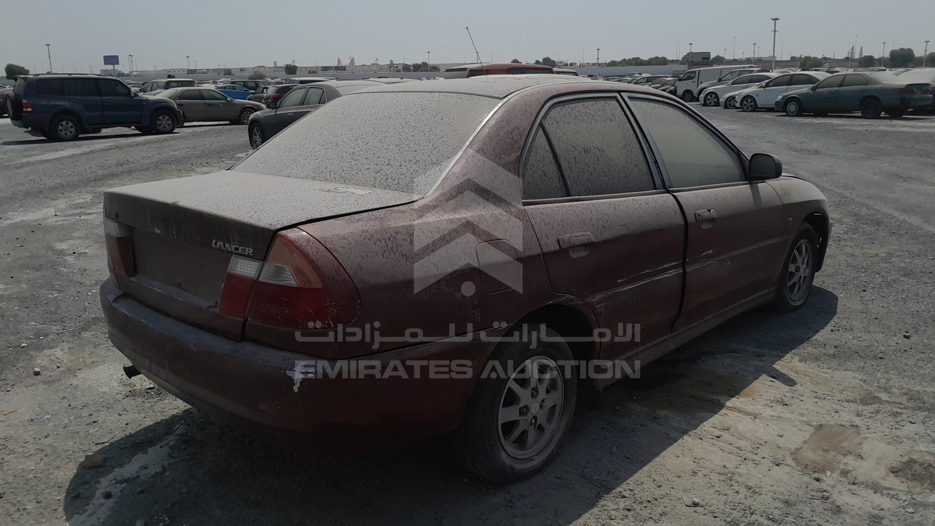 1999 MITSUBISHI LANCER VIN: JMYSRCK4AXU000886