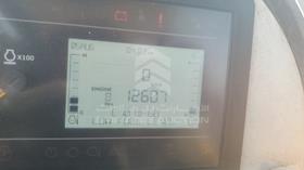 جي سي بي 540-70 2023 — قراءة العداد — صورة 2 — صورة مصغرة