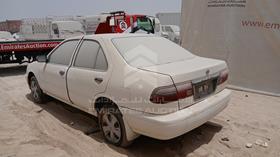 2000 Nissan Sunny — Rear Left Angle — Photo 5 — Thumbnail