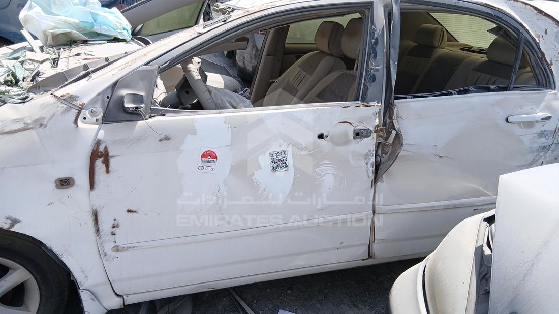 تويوتا كورولا 2003 — الباب الأمامي الأيسر — صورة 10