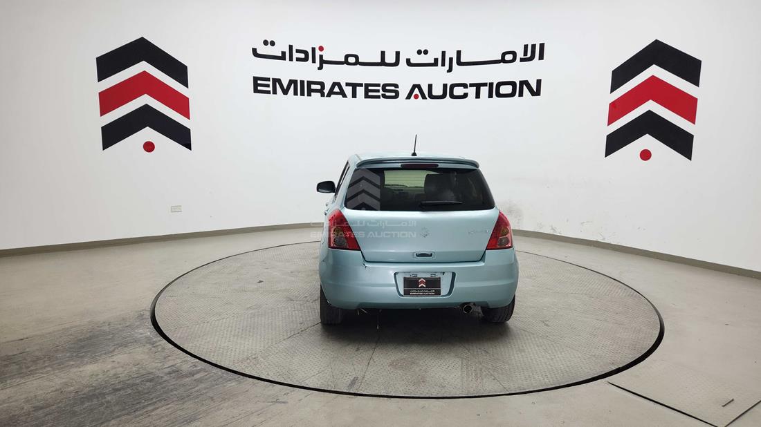 سوزوكي سويفت 2009 — الزاوية الخلفية اليسرى — صورة 8